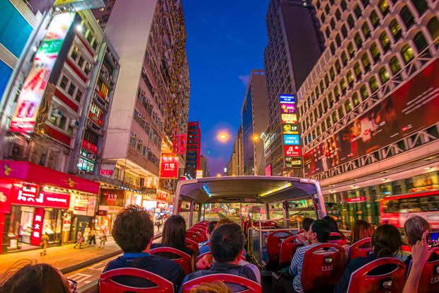 Hong Kong: Tour panoramico notturno di Kowloon in autobus scoperto