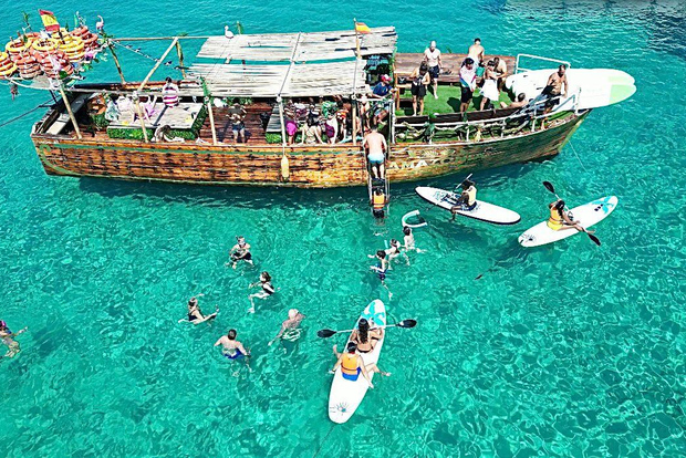 Ibiza: Grotte e calette marine Tour di snorkeling e paddle boarding