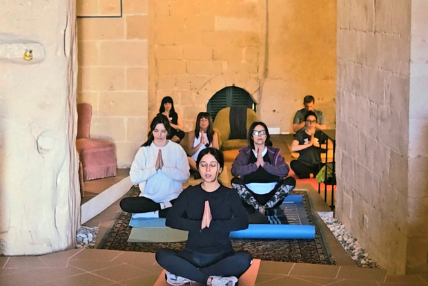 Matera: Yoga session in a Sassi cave with Breakfast