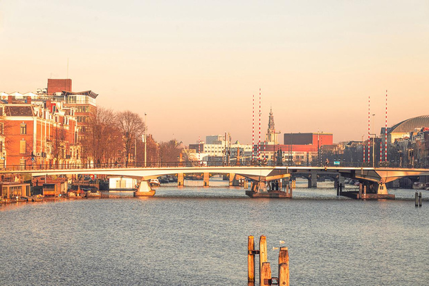 Scopri l'Amsterdam iconica: passeggiata fotografica con un fotografo pro